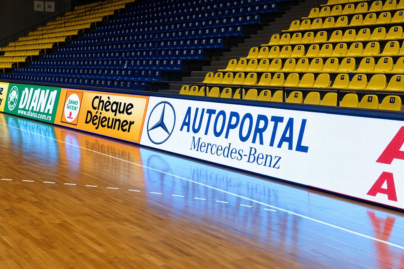 LED perimeter boards around the seating of an indoor arena