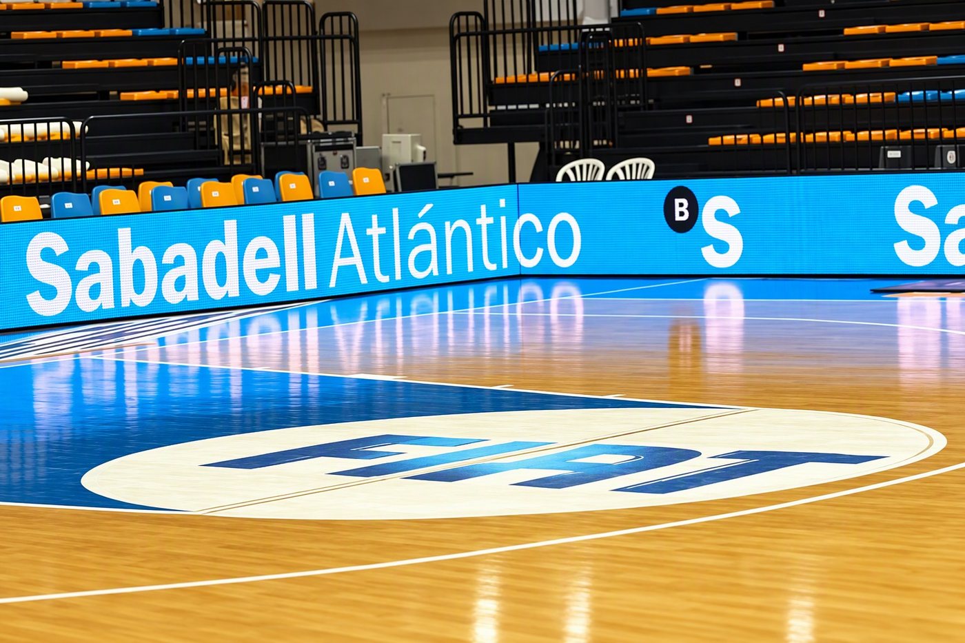 LED perimeter boards lining an indoor basketball court